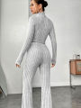 Stand Collar Navel T-shirt and Trumpet pants.