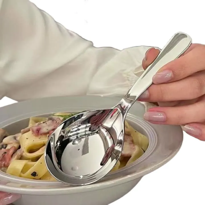 Superior%20Red%20Golden%20Dinner%20Spoon;%20Long-handled,%20Stainless%20Steel%20utensil;%20Essential%20for%20Stirring%20and%20Serving%20Desserts%20-%20Image%205