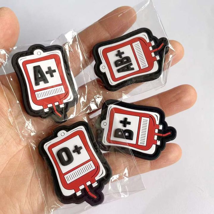 PVC%20%20Emblem%20Blood%20Bag%20Blood%20Type%20Patch%20A+%20B+%20AB+%20O+%20POS%20Tactical%20Badge%20Patches%20with%20Hook%20Loop%20For%20Uniform%20Helmet%20Backpack%20-%20Image%202