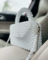 CUSTOMIZED HANDMADE PEARL BEADED BAG. 