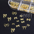 12Grids Metal Bow Nail Art Charm Gold 3D Bowknot Ribbon Nail Decoration Parts DIY Elegant Metallic Manicure Accessories Tools. 