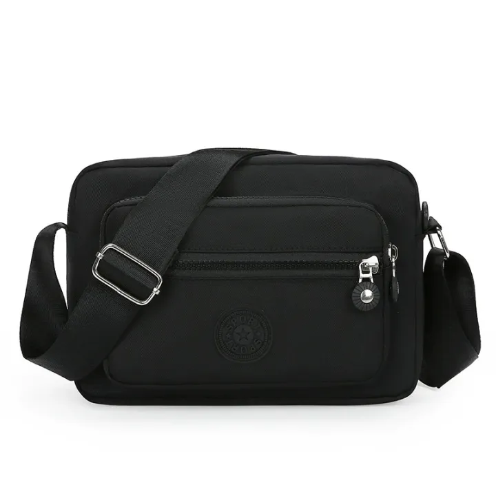 Lightweight%20Nylon%20Chic%20Crossbody%20Bag%20for%20Women%20-%20Adjustable%20Strap,%20Zip%20Closure,%20Tassel%20Accent,%20Solid%20Color%20-%20Image%207