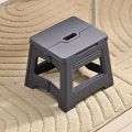 1pc Portable folding stool for outdoor adventures - durable plastic, ideal for travel and home use.