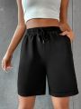 Women's sports shorts and sweatpants solid color pants with pockets and drawstrings loose knitted sweatpants. 