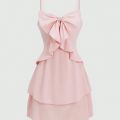 Fashionable women's waist cinched three-layer ruffle edge bow suspender dress. 