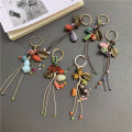 Handmade Bag Keychain Ceramic Pendant Pinecone Gourd Pendant for Handbag Car Phone Key Cute Bag Hanging Bell Accessories. 