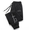 Hot Sales Womens Sweatpants Daily Casual Pants High Quality Fitness Tracksuit Trousers Heart Print Street Sport Jogging Pants.