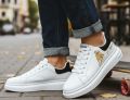 School shoes for boys with soft rubber sool and white.