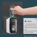 MENGNI Toothpaste Dispenser Wall-Mounted Bathroom Toothpaste Squeezer Punch-Free Toothbrush Holder Rack manual operation.