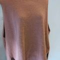 Peach oversized sleeveless body covering sweater. 