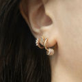 Trendy Small Round Gold Color Stainless Steel Huggies Hoop Earrings for Women Zirconia CZ Triple Gear Charm Earrings Ear Buckle.