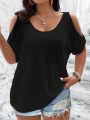 Plus Size Cold Shoulder T-Shirt for Women Casual Loose Fit Summer Top with Trendy Cutouts.