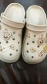 Beautiful Cream Fancy Design Crocs For Women. 
