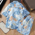 Comfort beach style: beautiful striped short-sleeved shirt, modern shorts. 