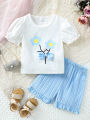 Children’s 2025 New Summer Printed Bowknot Short-sleeve T-shirt with Solid-color Shorts Fashionable and Versatile Two-piece Set. 