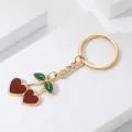 Cute Red Enamel Cherry Pendant Keychain for Women Girls Lovely Gold Color Fruit Keyring Keys Holder for Backpack Bag Gifts. 