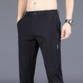 2024 Summer New Thin Ice Silk Stretch Men's Pants Casual Elastic Waist Smooth Trouser Pants Male Brand Clothing 5 Colour. 