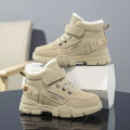 A pair of children's winter velvet warm snow boots with leather waterproof and anti-slip wear-resistant high-top cotton shoes. 