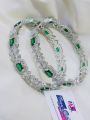 High quality diamond cut ad stone green color party wear exclusive design bangles for ladies.