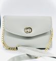 white coloured strap bag. 