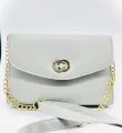 white coloured strap bag. 