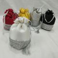 traditional potli gol bag clutch with silver lace. 