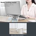 Foldable laptop stand for bed lightweight ventilate portable laptop stand with 7-Level adjustable Height  for 11 - 15 Inch notebook stand ABS High Quality plastic laptop stand with aluminum center rod and non-slip silicon grip.. 