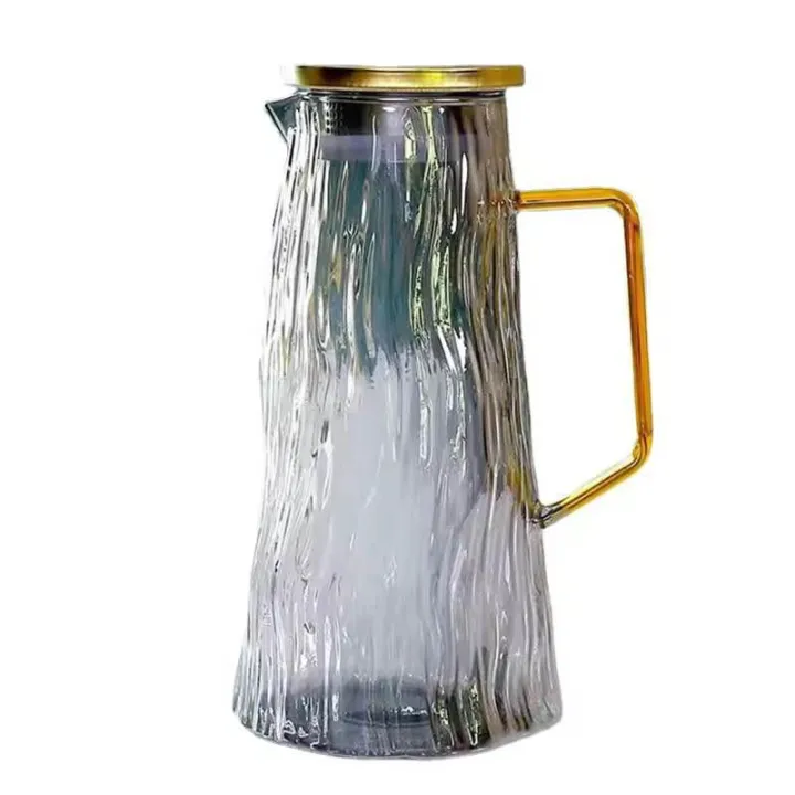 Luxury%20Hammered%20Glass%20Water%20Pitcher%20with%20Gold%20Tone%20Handle%20&%20Lid%20%20Modern%20Heat%20Resistant%20Iced%20Tea%20Juice%20&%20Sangria%20Decanter%20by%20Carpets%20Galaxy%20-%20Image%204