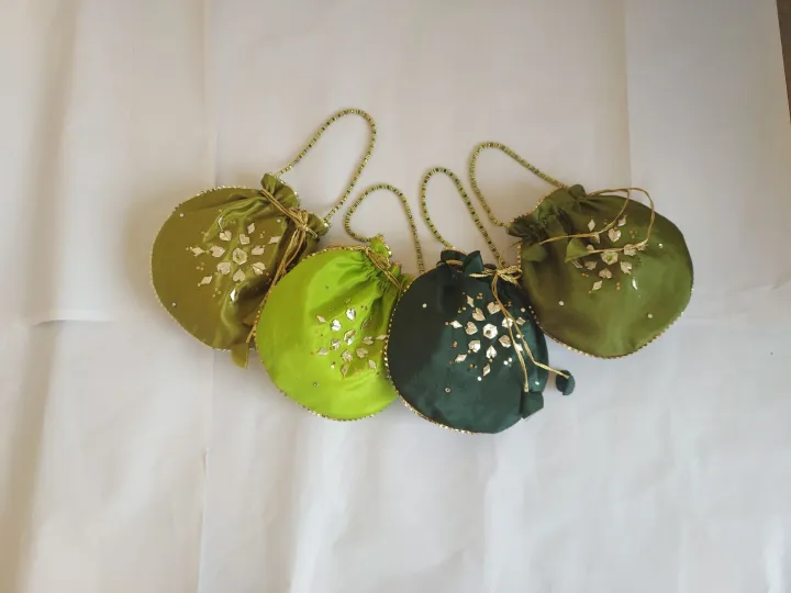 Fancy%20embroidered%20clutch/potli%20bag%20for%20wedding%20parties%20designer%20traditional%20potli%20gol%20bag%20with%20Handmade%20Gota%20work%20-%20Image%207