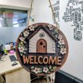 8 Inch Round Welcome Door Sign - 2D Flat House & Floral Design Hanging Wall Decor for Home Entryway. 