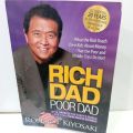 RICH  DAD poor dad by Robert t, kiyosaki. 