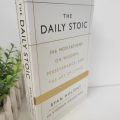 The Daily Stoic by Ryan Holiday: 366 Meditations on Wisdom, Perseverance, and the Art of Living - Bilingual Edition Hardcover. 