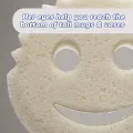 Free dual-sided scrubber + sponge (Scrub Daddy®) White smile face sponge. 