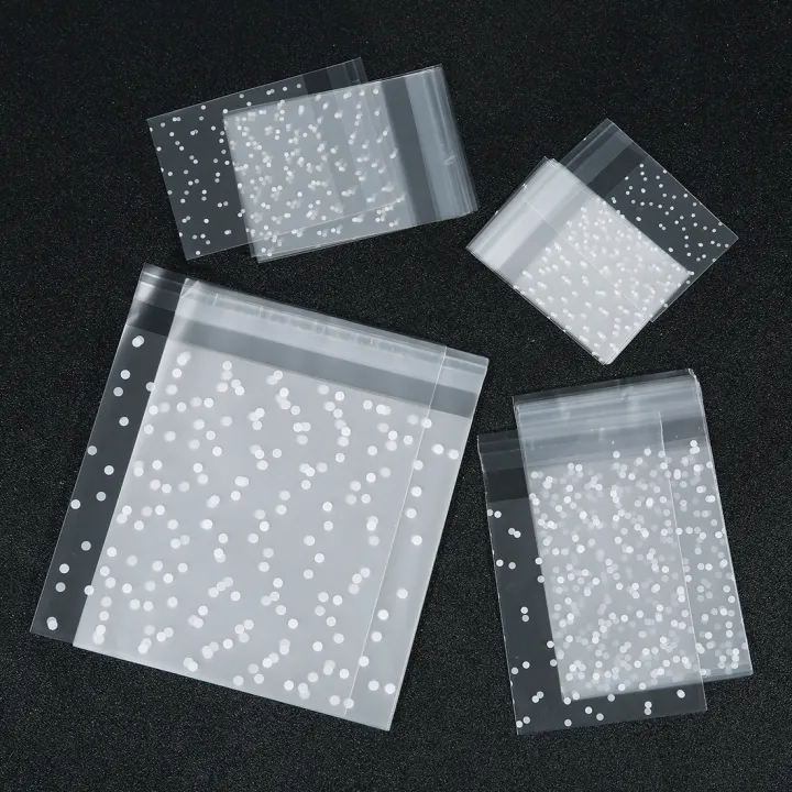 100pcs/lot%20Self%20Sealing%20Gift%20Bag%20White%20Polka%20Dot%20Transparent%20Packaging%20Bags%20Frosted%20Dot%20Pattern%20Bag%20For%20Jewelry%20Cookie%20Storage%20-%20Image%202