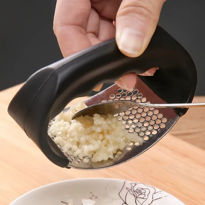 Upgraded%20Stainless%20Steel%20Garlic%20Press%20&%20Rocker%20%E2%80%93%20Manual%20Squeezer%20for%20Garlic,%20Ginger,%20and%20Herbs%20-%20Image%203