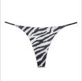 Leopard print women's thongs, zebra print python print low-rise bikini panties. 