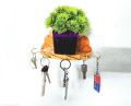 Wooden key holder with artificial Flower for decoration.