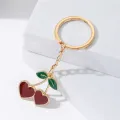 Cute Red Enamel Cherry Pendant Keychain for Women Girls Lovely Gold Color Fruit Keyring Keys Holder for Backpack Bag Gifts. 