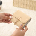 Wallet women's short 2024 summer new women's flower pendant three fold bag large capacity folding multi-functional student coin. 