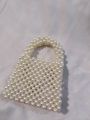 Handmade Luxury Pearl Beaded Clutch – Elegant Bag for Special Occasions. 