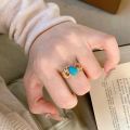 turquoise rings for women Classic retro wave hollow out luster light luxury refreshing blue oval ring banquet fine jewelry. 