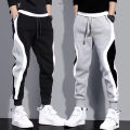 Autumn Men's Wide Loose Casual Pants Mens Patchwork Nine-point Sports  Elastic Rope Breathable Tie-foot Trousers. 