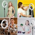 26cm Ring Light With Mobile Holder With 7Feet Tripod Stand in Three Different Mode Light 26CM/36CM Selfie LED Ring Light with 7ft Tripod Stand Mobile Phone Holder 26 CM ringlight 7 feet tripod stand 3 Modes RingLight Vlogging Light Mobile Phone Photograph. 