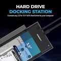 USB 3.0 to SATA External Hard Drive Lay-Flat Docking Station (model EC-DFFN or similar) with a WUSB 3.0 to SATA External Hard Drive Lay-Flat Docking Station (model EC-DFFN or similar) with a W-t-ern Digestern Digital (W-D) Green 14TB hard drive inserted. .