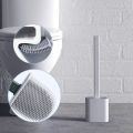 NEW SILICONE TOILET CLEANING BRUSH AND HOLDER SET.