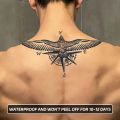 Long-lasting waterproof tattoo sticker non-reflective temporary tattoo eagle compass pattern fake tattoo on back of arm. 