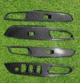 Toyota Yaris power window trims carbon fibre 4pcs set. 