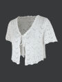 Women's knitting beach short-sleeved wispy knit cardigan.