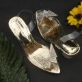 butterfly heel sendal. 