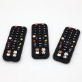 Silicone cartoon simulation remote control, dental adhesive grinding toy with buttons.